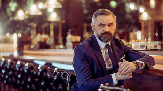 Bearded man enjoying life after using chemical-free, hypoallergenic beard dye.